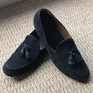 Dark blue suede loafers with tassels
